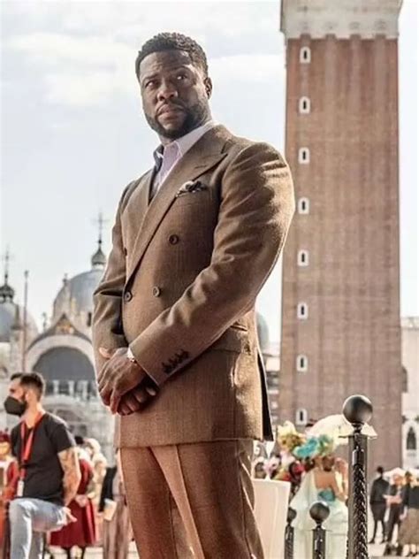 kevin hart in brown suit.